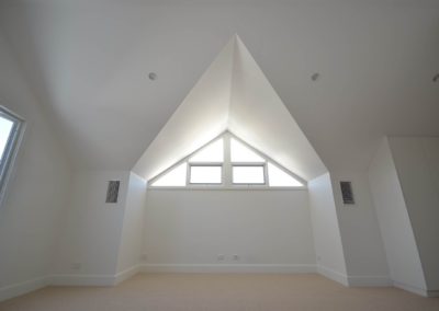 Feature cathedral window to maximise space and light in home on Ann Street in Williamstown